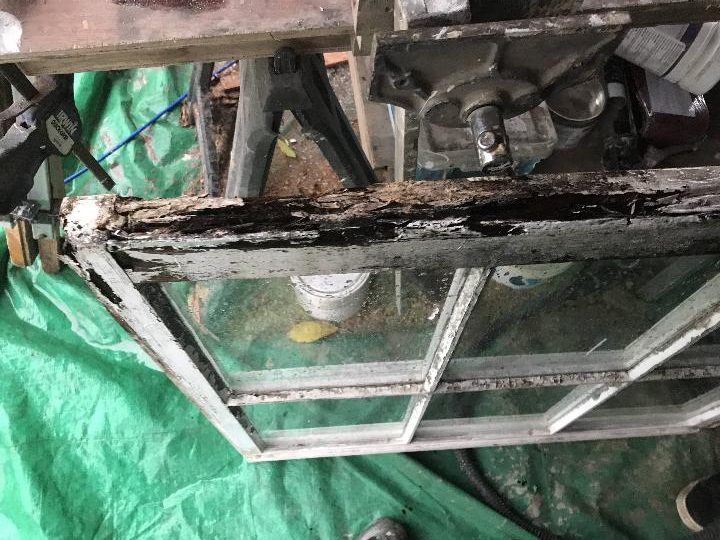 This is a Georgian sash window as you can see the bottom rail and both styles are completely rotten